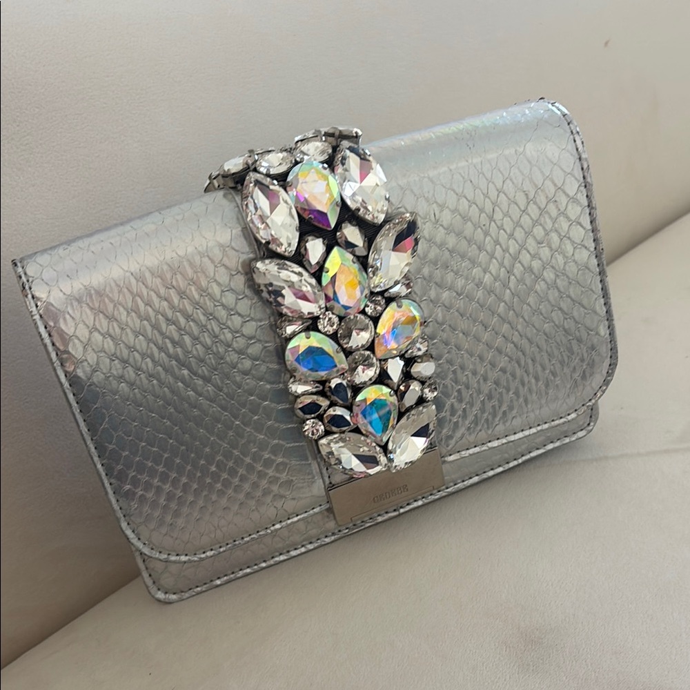 Gedebe
Cliky Metallic Snake-Print clutch RARE sold out